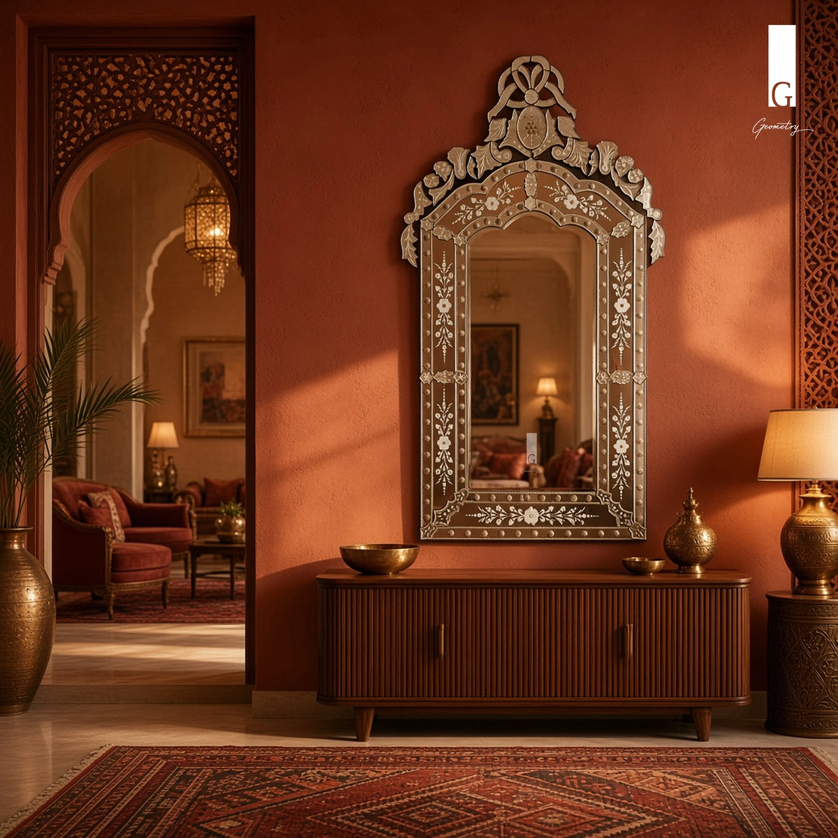 Geometry Designs Venetian Mirror in etched silver glass, shown above a fluted walnut sideboard in a terracotta modern Indian living room.