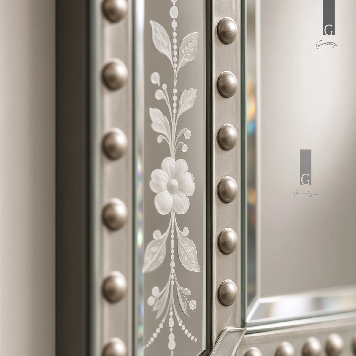 Geometry Designs Venetian Mirror etched glass border with floral vine engraving and glass studs, shown in a close-up.