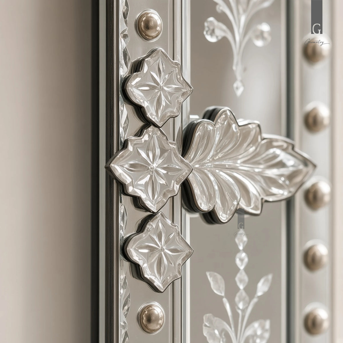 Geometry Designs Venetian Mirror glass rosettes, leaf ornament and studs at mid-frame, shown in a close-up.